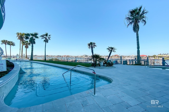 community pool featuring fence
