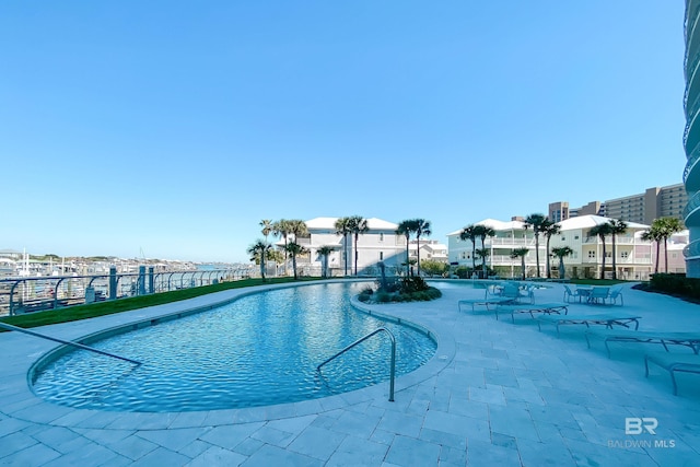 community pool featuring a patio