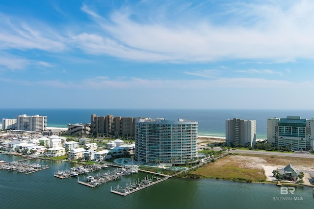 aerial view featuring a water view and a view of city