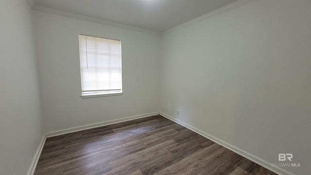 509 Pine St, Daphne, AL 36526 - empty room featuring dark wood-style floors and crown molding