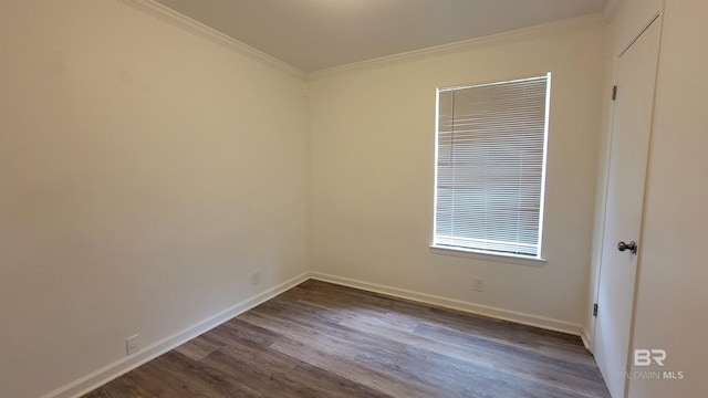 509 Pine St, Daphne, AL 36526 - spare room with dark wood-type flooring and crown molding