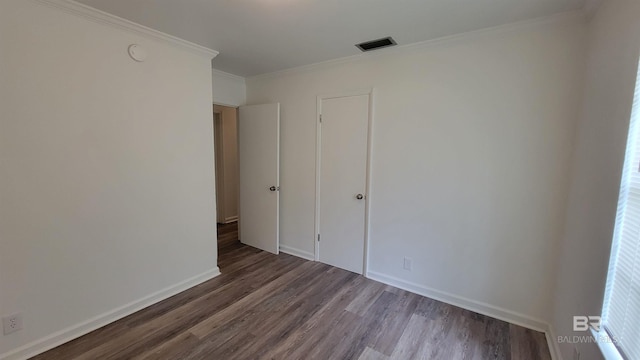 509 Pine St, Daphne, AL 36526 - spare room featuring wood finished floors and ornamental molding