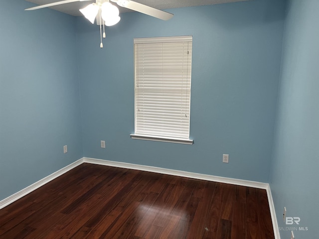 unfurnished room with wood-type flooring and ceiling fan