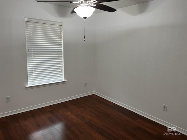 empty room with hardwood / wood-style flooring and ceiling fan