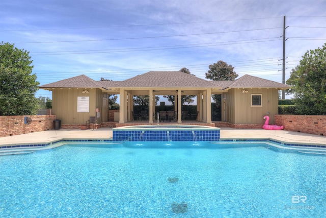 view of pool featuring pool water feature