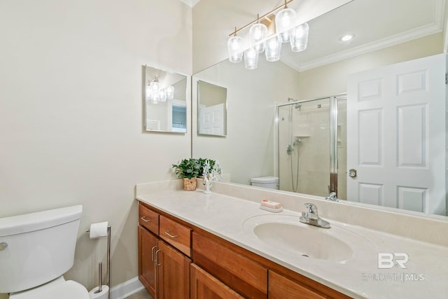 bathroom featuring toilet, vanity, an enclosed shower, and ornamental molding