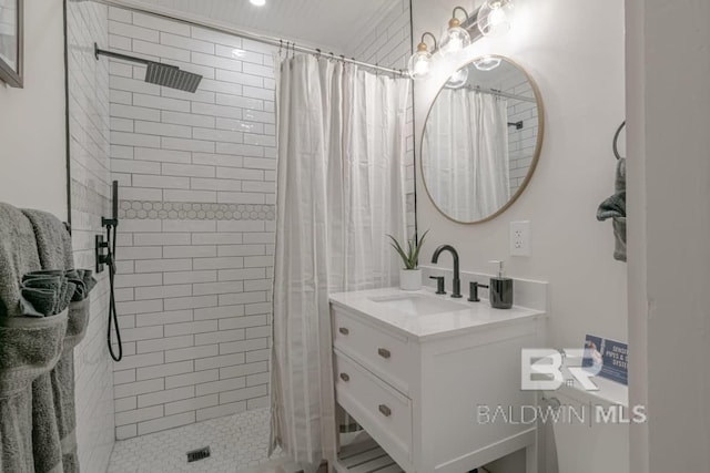 bathroom featuring vanity and walk in shower