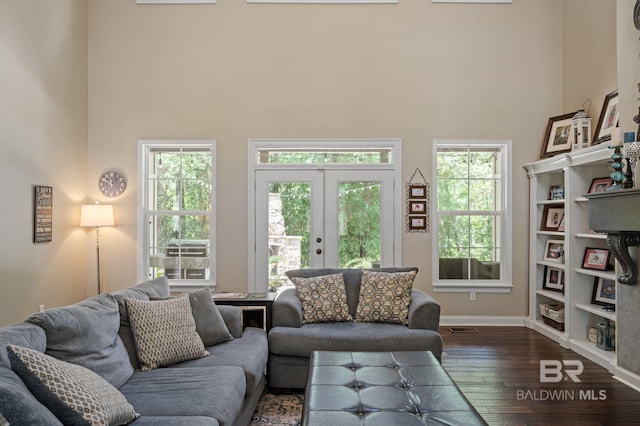 7371 Maureen Cir, Spanish Fort, AL 36527 - living room with a high ceiling, dark wood-style flooring, and french doors