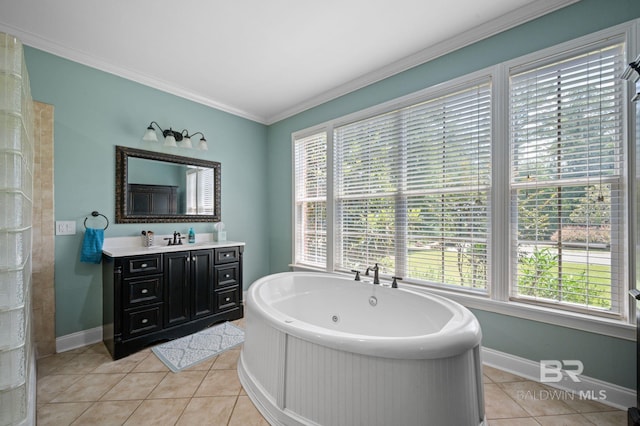 7371 Maureen Cir, Spanish Fort, AL 36527 - bathroom featuring vanity, tile patterned flooring, a whirlpool tub, and ornamental molding