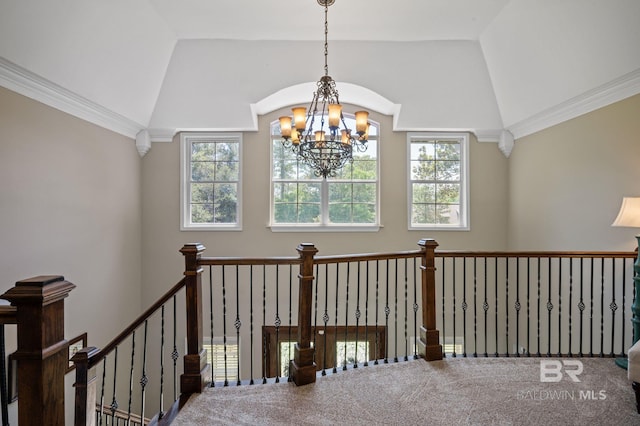 7371 Maureen Cir, Spanish Fort, AL 36527 - hallway with a chandelier, lofted ceiling, an upstairs landing, healthy amount of natural light, and carpet flooring