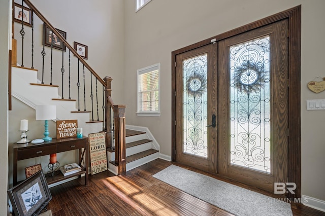 7371 Maureen Cir, Spanish Fort, AL 36527 - foyer featuring french doors, stairs, and dark wood-type flooring