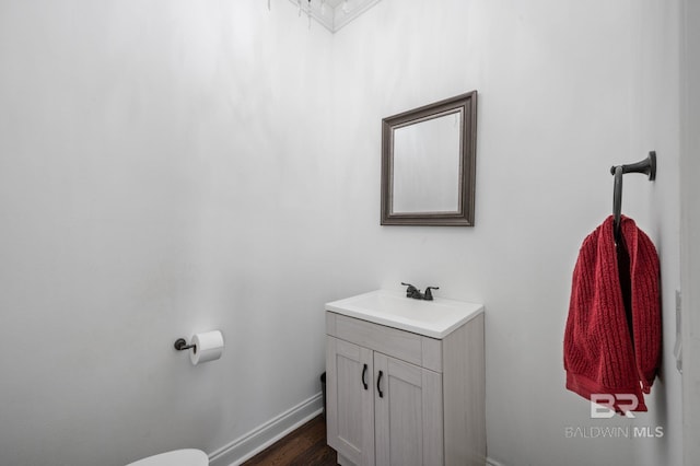 7371 Maureen Cir, Spanish Fort, AL 36527 - half bath with vanity and wood finished floors