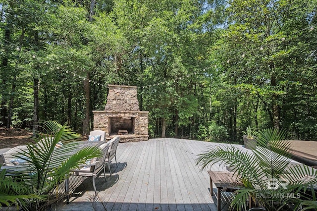 7371 Maureen Cir, Spanish Fort, AL 36527 - deck with an outdoor stone fireplace