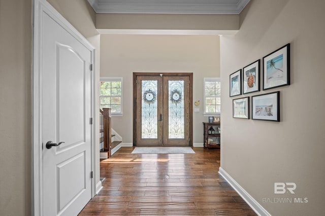 7371 Maureen Cir, Spanish Fort, AL 36527 - entrance foyer featuring french doors, dark wood-type flooring, crown molding, and stairway