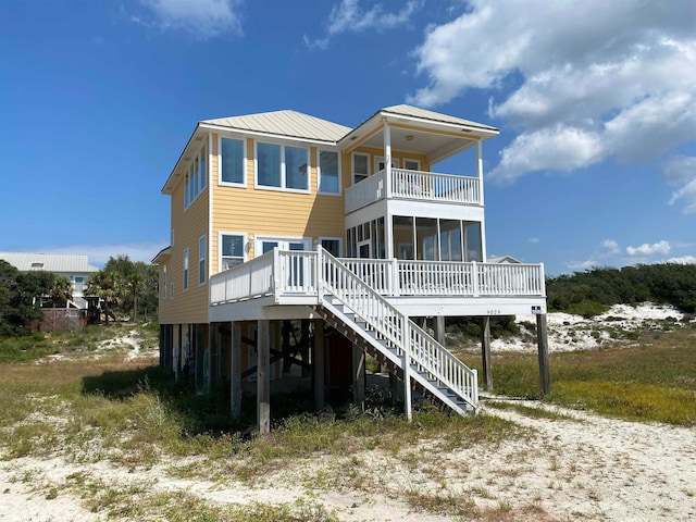 rear view of property with a deck