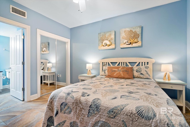 bedroom featuring ceiling fan and a closet