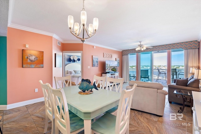 tiled dining space featuring ornamental molding and ceiling fan with notable chandelier