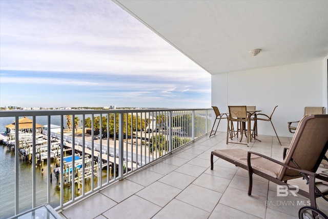 balcony featuring a water view