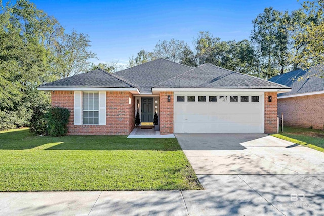 ranch-style house with a front yard and a garage