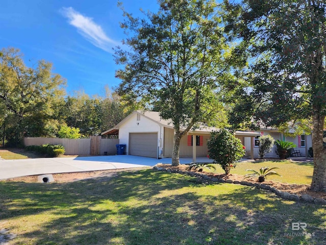 single story home with a garage and a front lawn