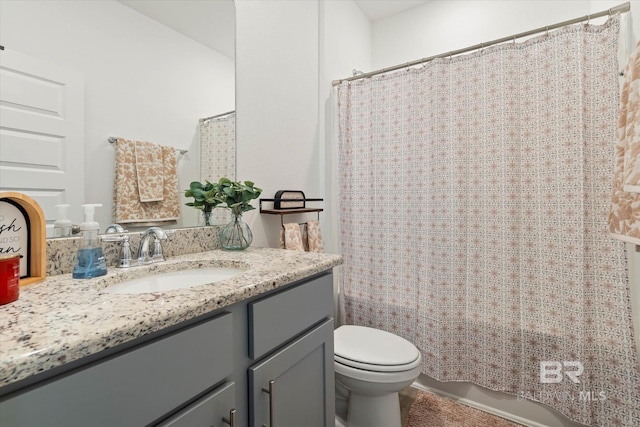 3973 Mercury Cir, Gulf Shores, AL 36542 - bathroom featuring vanity and toilet