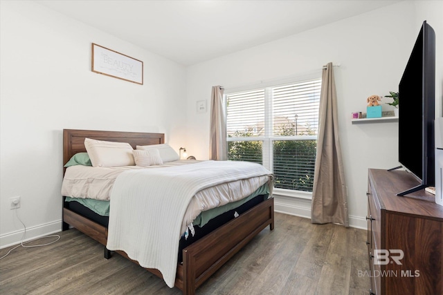 3973 Mercury Cir, Gulf Shores, AL 36542 - bedroom featuring wood finished floors and baseboards