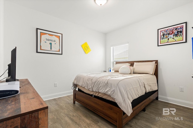 3973 Mercury Cir, Gulf Shores, AL 36542 - bedroom with wood finished floors