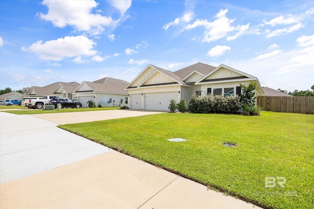 3973 Mercury Cir, Gulf Shores, AL 36542 - view of front of house featuring board and batten siding, concrete driveway, a garage, and a residential view