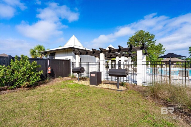 3973 Mercury Cir, Gulf Shores, AL 36542 - view of yard with a community pool