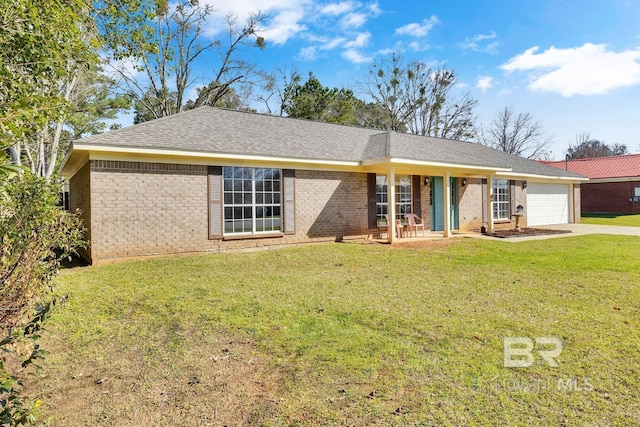 single story home with a front yard, driveway, an attached garage, a shingled roof, and brick siding