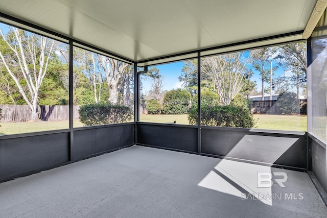 unfurnished sunroom with a wealth of natural light