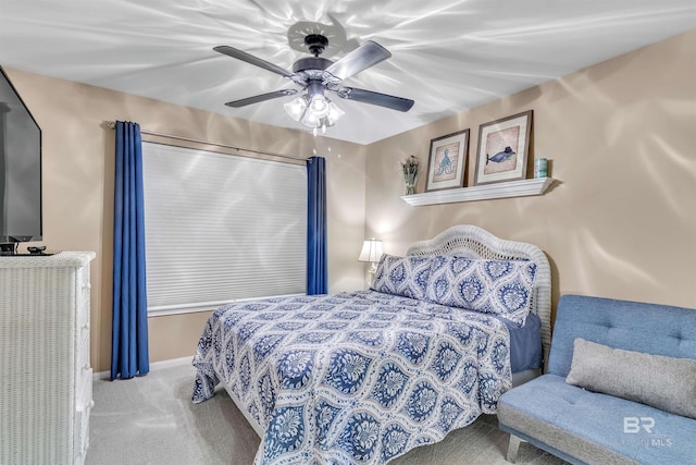 1517 Regency Rd Unit 121, Gulf Shores, AL 36542 - carpeted bedroom with a ceiling fan and baseboards
