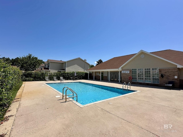 1517 Regency Rd Unit 121, Gulf Shores, AL 36542 - community pool with a patio