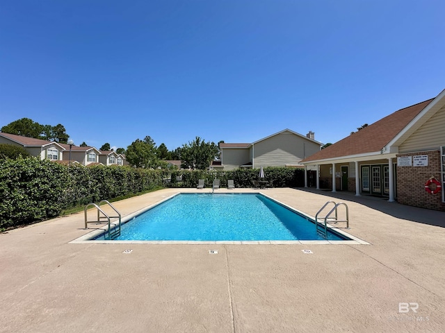 1517 Regency Rd Unit 121, Gulf Shores, AL 36542 - community pool featuring a patio