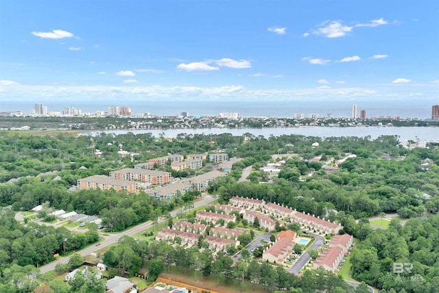 1517 Regency Rd Unit 121, Gulf Shores, AL 36542 - view of urban area featuring a nearby body of water and a tree filled landscape