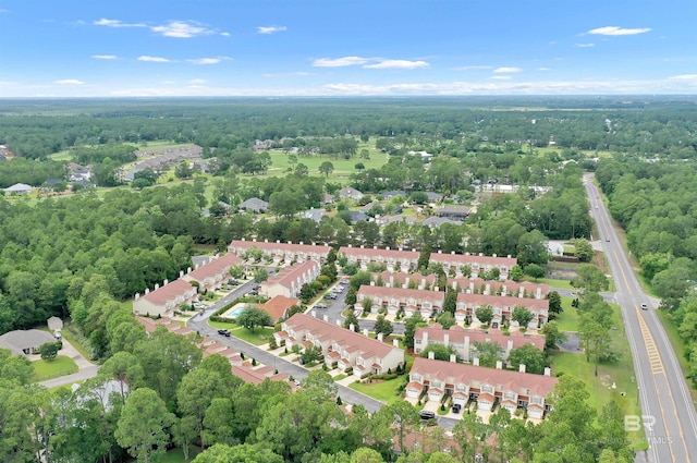 1517 Regency Rd Unit 121, Gulf Shores, AL 36542 - aerial view of residential area featuring a heavily wooded area