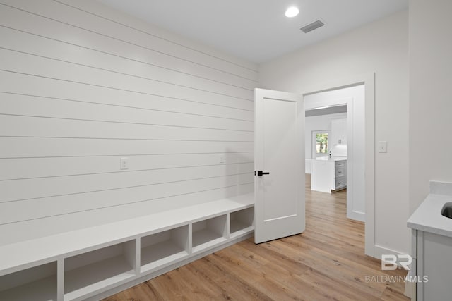 mudroom featuring light hardwood / wood-style flooring