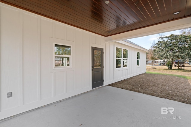 doorway to property with a patio