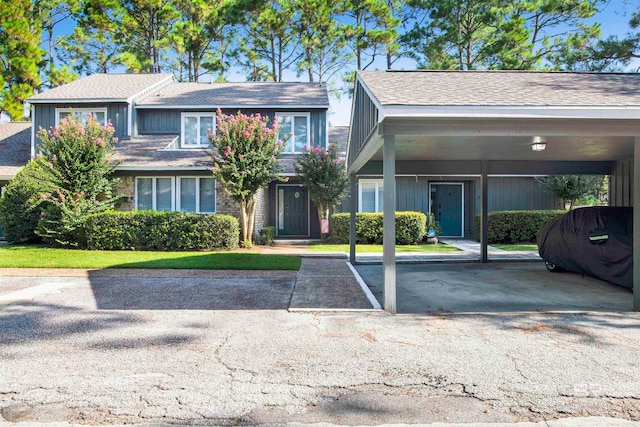 view of front of property with a carport