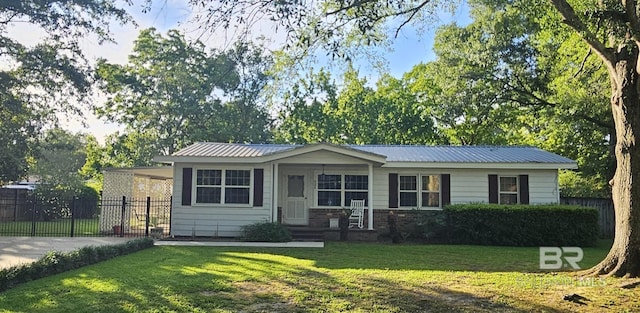 524 Linda Ln, Saraland, AL 36571 - ranch-style house featuring metal roof and driveway