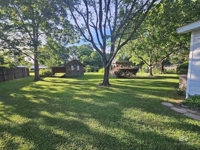 524 Linda Ln, Saraland, AL 36571 - view of yard featuring an outbuilding