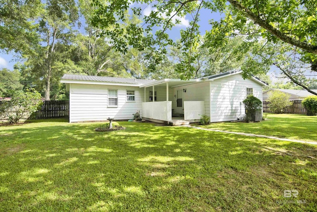 524 Linda Ln, Saraland, AL 36571 - back of house featuring metal roof and a deck