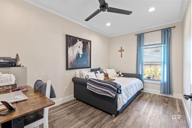 bedroom with ornamental molding, recessed lighting, dark wood finished floors, and baseboards