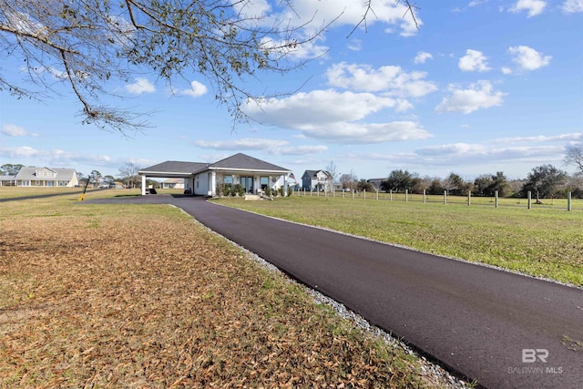 view of road featuring driveway