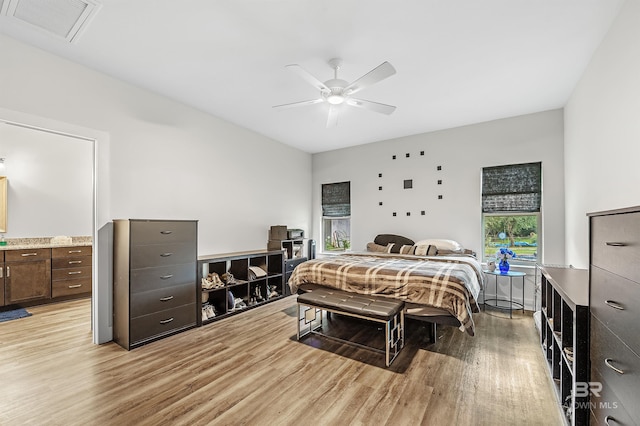 bedroom featuring ceiling fan and light hardwood / wood-style flooring