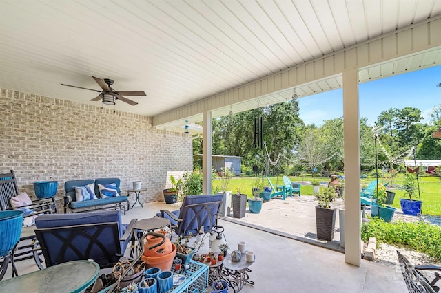 view of patio with ceiling fan and an outdoor hangout area