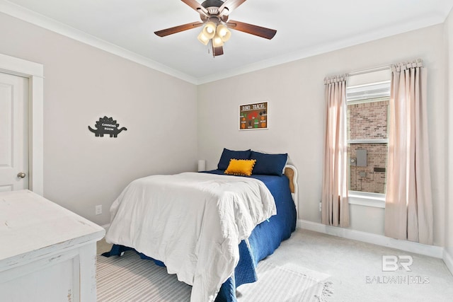 carpeted bedroom with multiple windows, crown molding, and ceiling fan