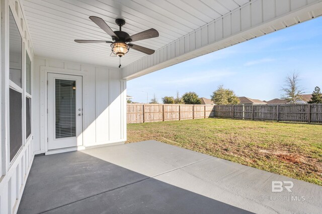 view of patio featuring ceiling fan and a fenced backyard