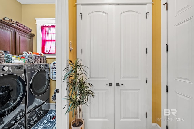 10128 Alder Ave, Spanish Fort, AL 36527 - laundry room with separate washer and dryer, cabinet space, and baseboards