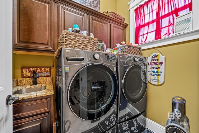 10128 Alder Ave, Spanish Fort, AL 36527 - laundry room with cabinet space and independent washer and dryer